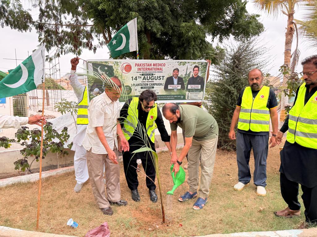 PMISWA plantation campaign in Karachi on 14th August with volunteers planting trees for environmental awareness.