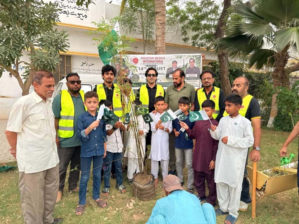 PMISWA plantation campaign in Karachi on 14th August with volunteers planting trees for environmental awareness.